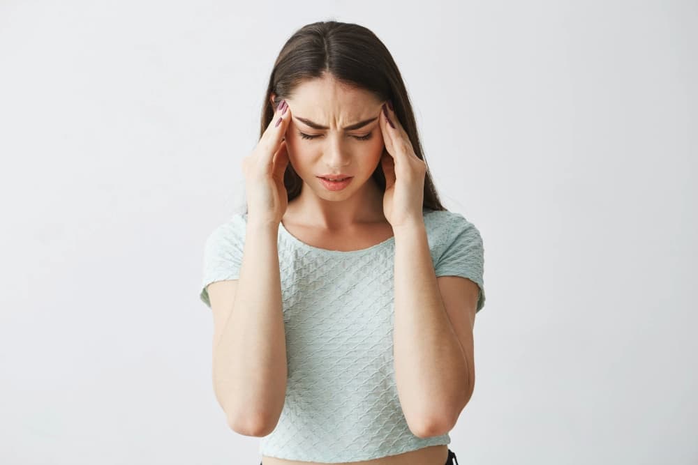 15 Causes of Headaches on Top of the Head (Updated 2023)